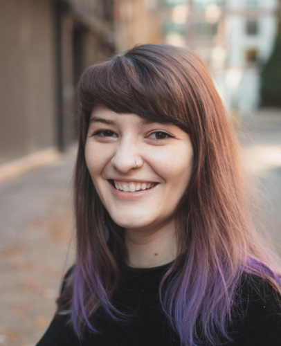Amy Gadd (a woman with bangs, smiling)